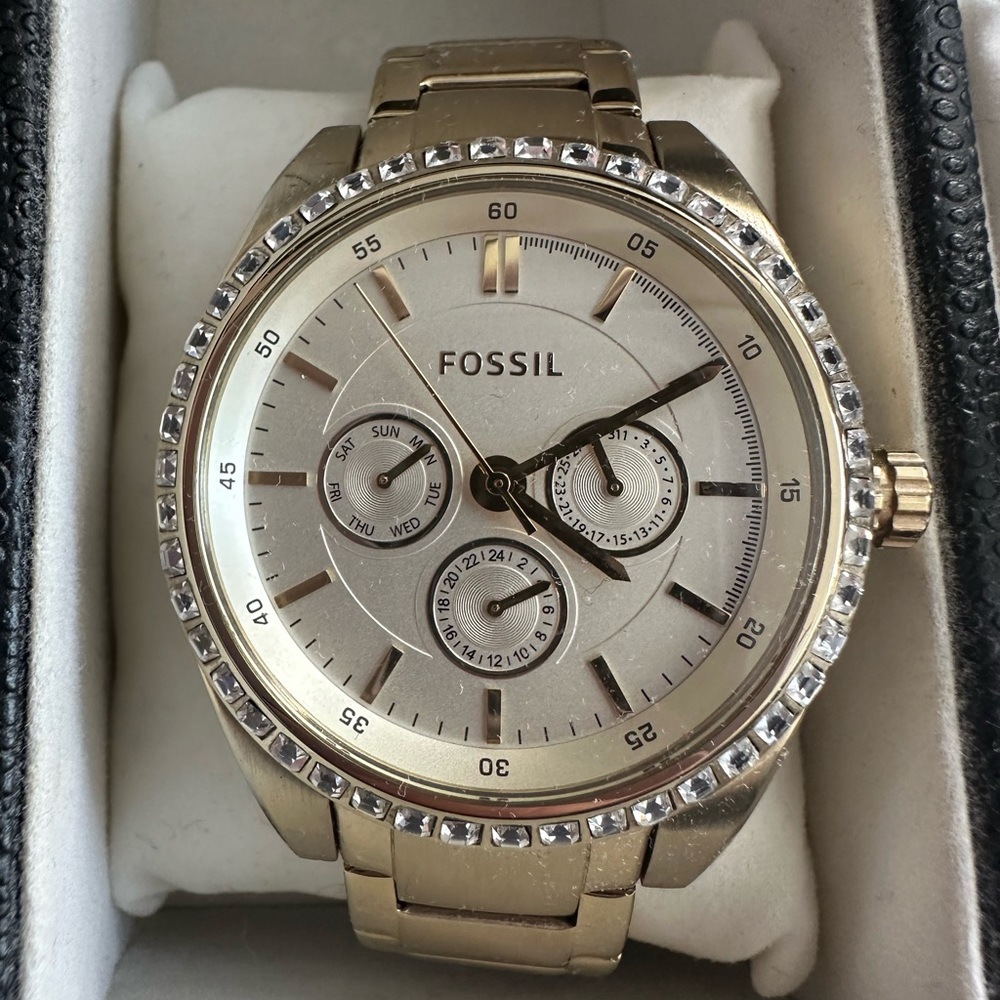 Gold fossil watch
